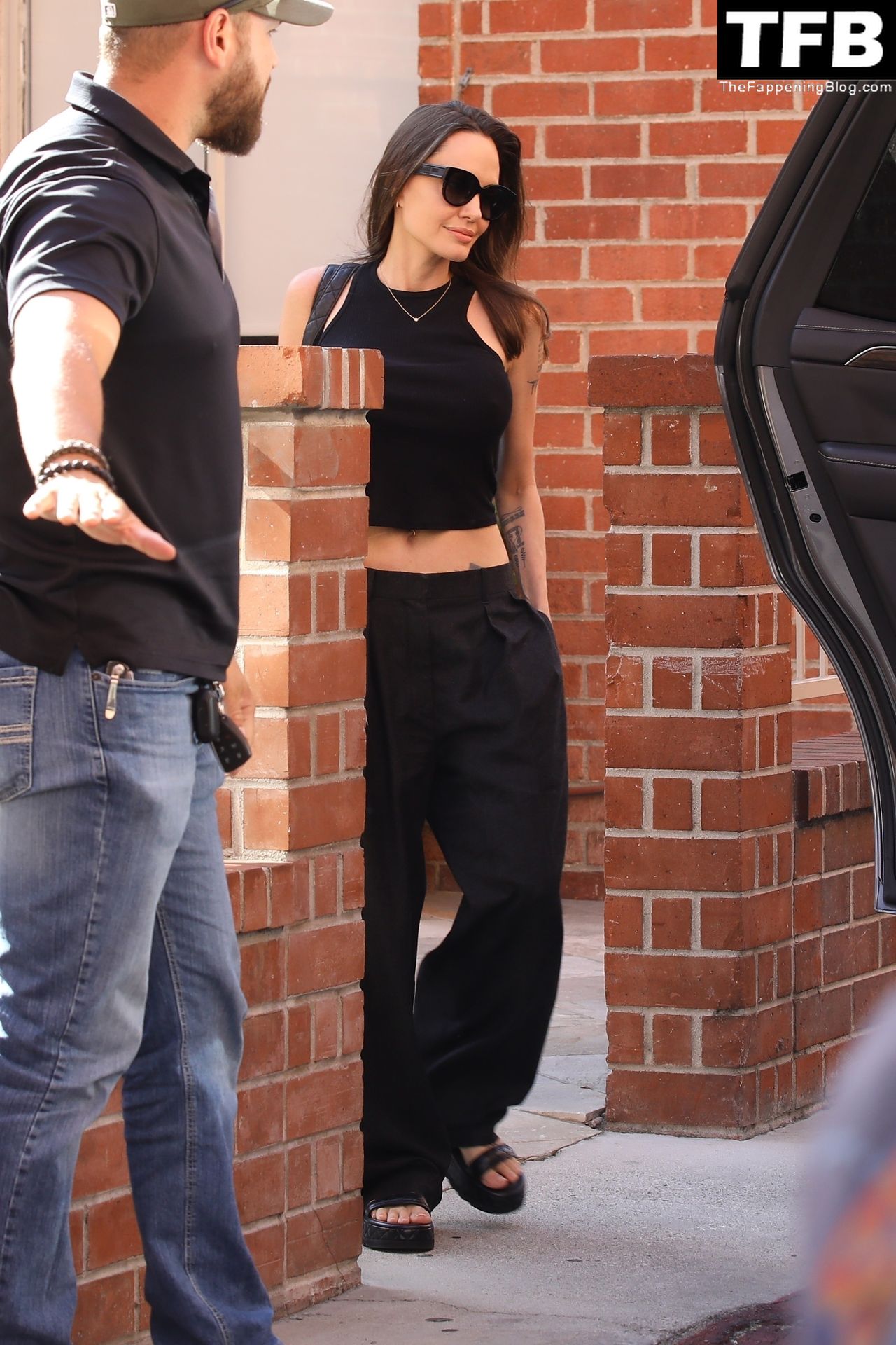 Angelina Jolie Braless The Fappening Blog 12 - Angelina Jolie Shows Off Her Tight Tummy Leaving an Office Building (33 Photos)
