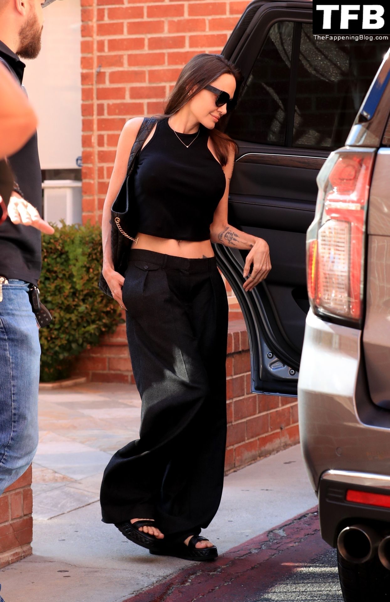 Angelina Jolie Braless The Fappening Blog 16 - Angelina Jolie Shows Off Her Tight Tummy Leaving an Office Building (33 Photos)