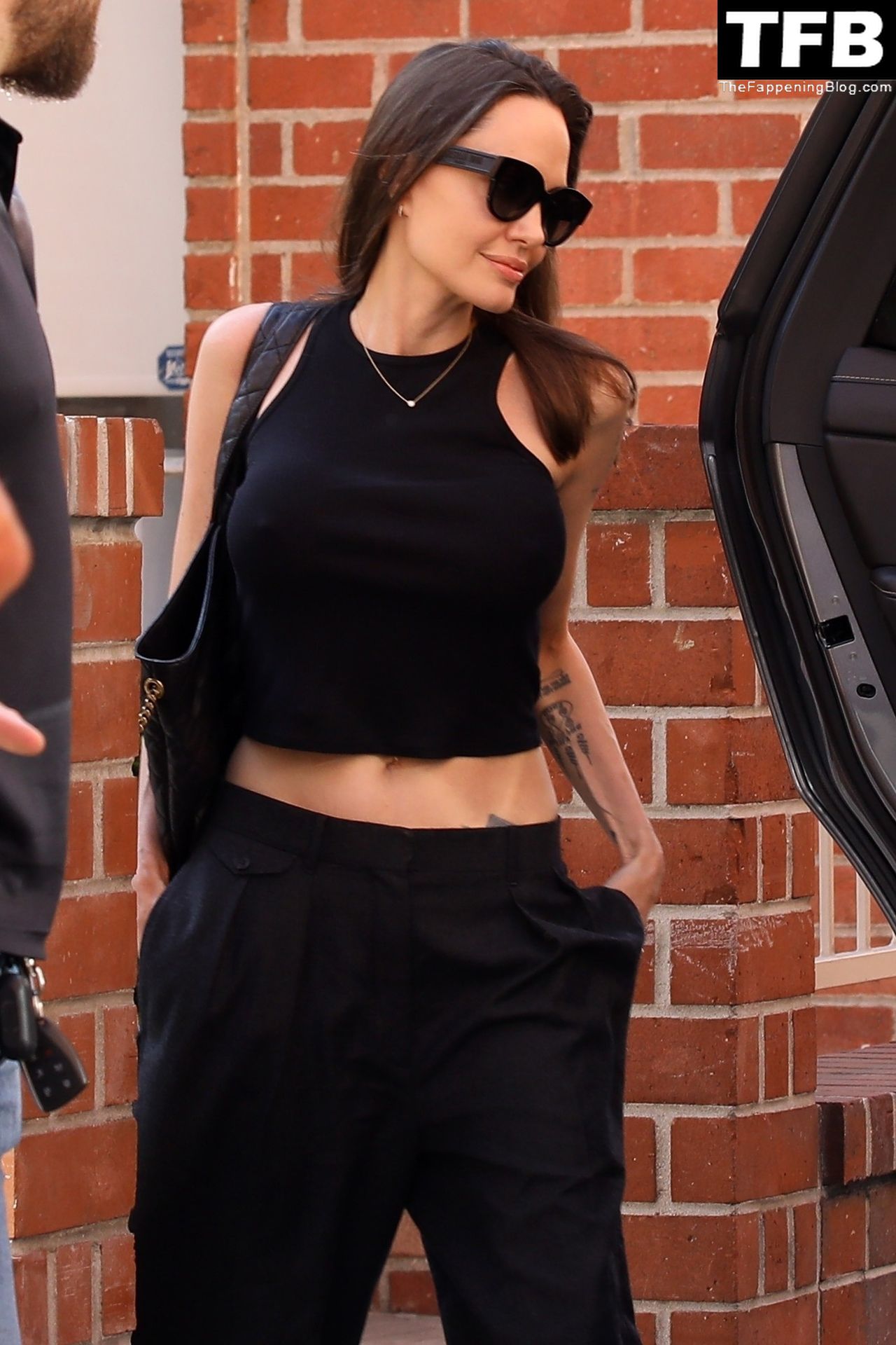 Angelina Jolie Braless The Fappening Blog 6 - Angelina Jolie Shows Off Her Tight Tummy Leaving an Office Building (33 Photos)