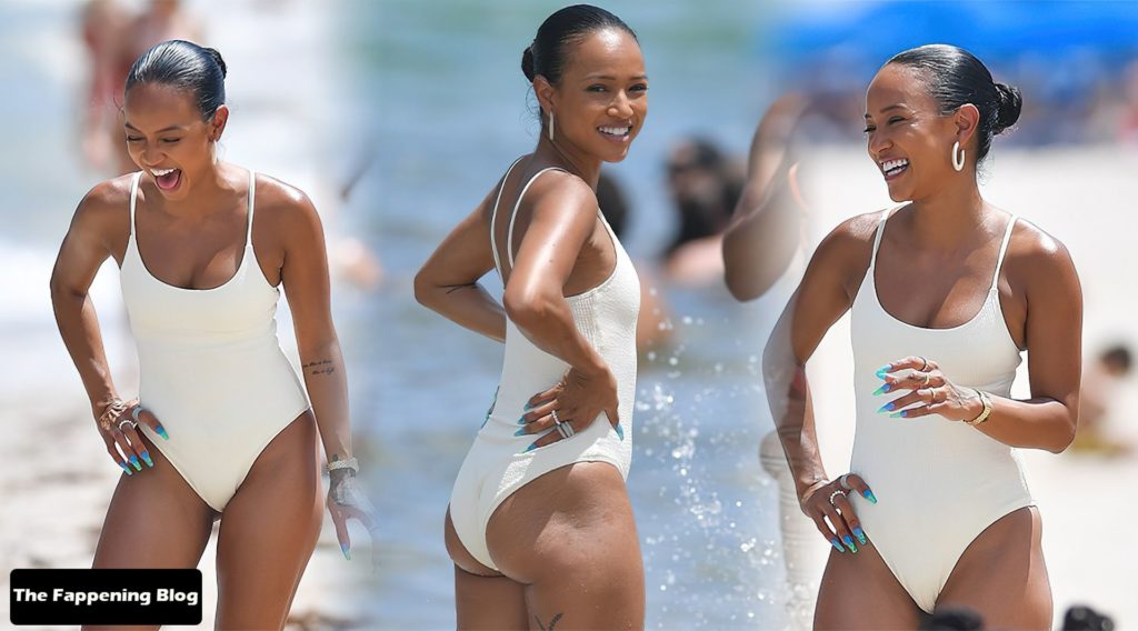 Karrueche Tran Sexy Ass in Swimsuit 1 thefappeningblog.com  1024x568 - Karrueche Tran Looks Incredible in a White Swimsuit on the Beach in Miami (45 Photos)