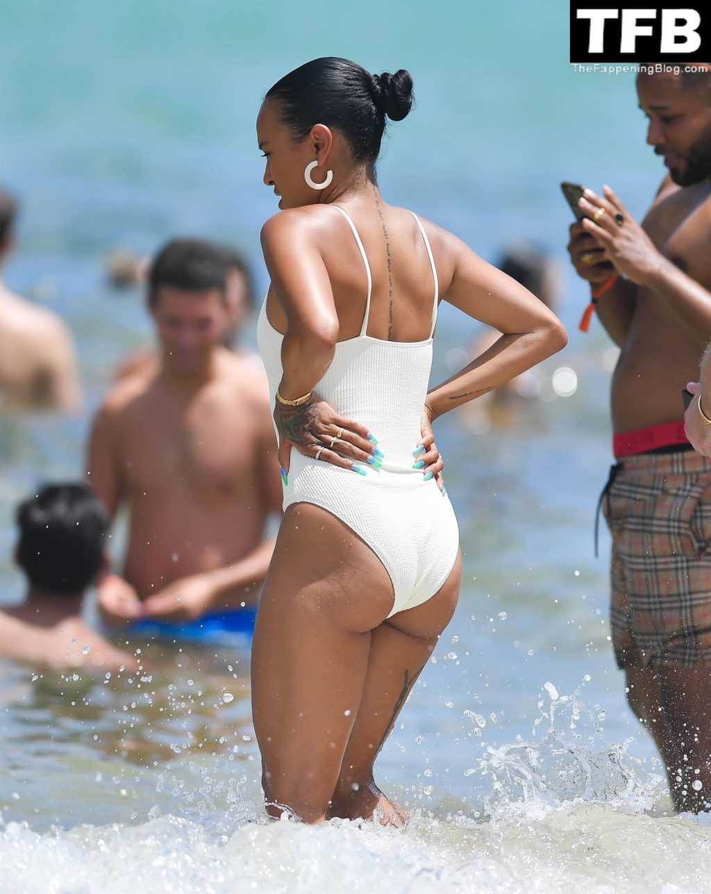 Karrueche Tran Sexy The Fappening Blog 14 1024x1287 - Karrueche Tran Looks Incredible in a White Swimsuit on the Beach in Miami (45 Photos)