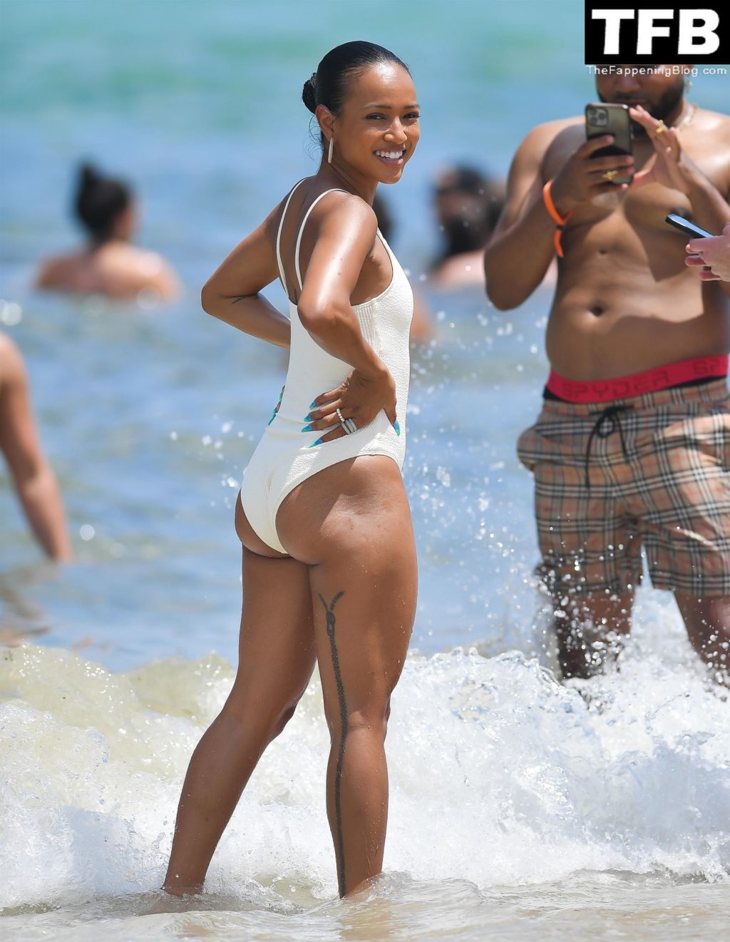 Karrueche Tran Sexy The Fappening Blog 2 1024x1321 - Karrueche Tran Looks Incredible in a White Swimsuit on the Beach in Miami (45 Photos)