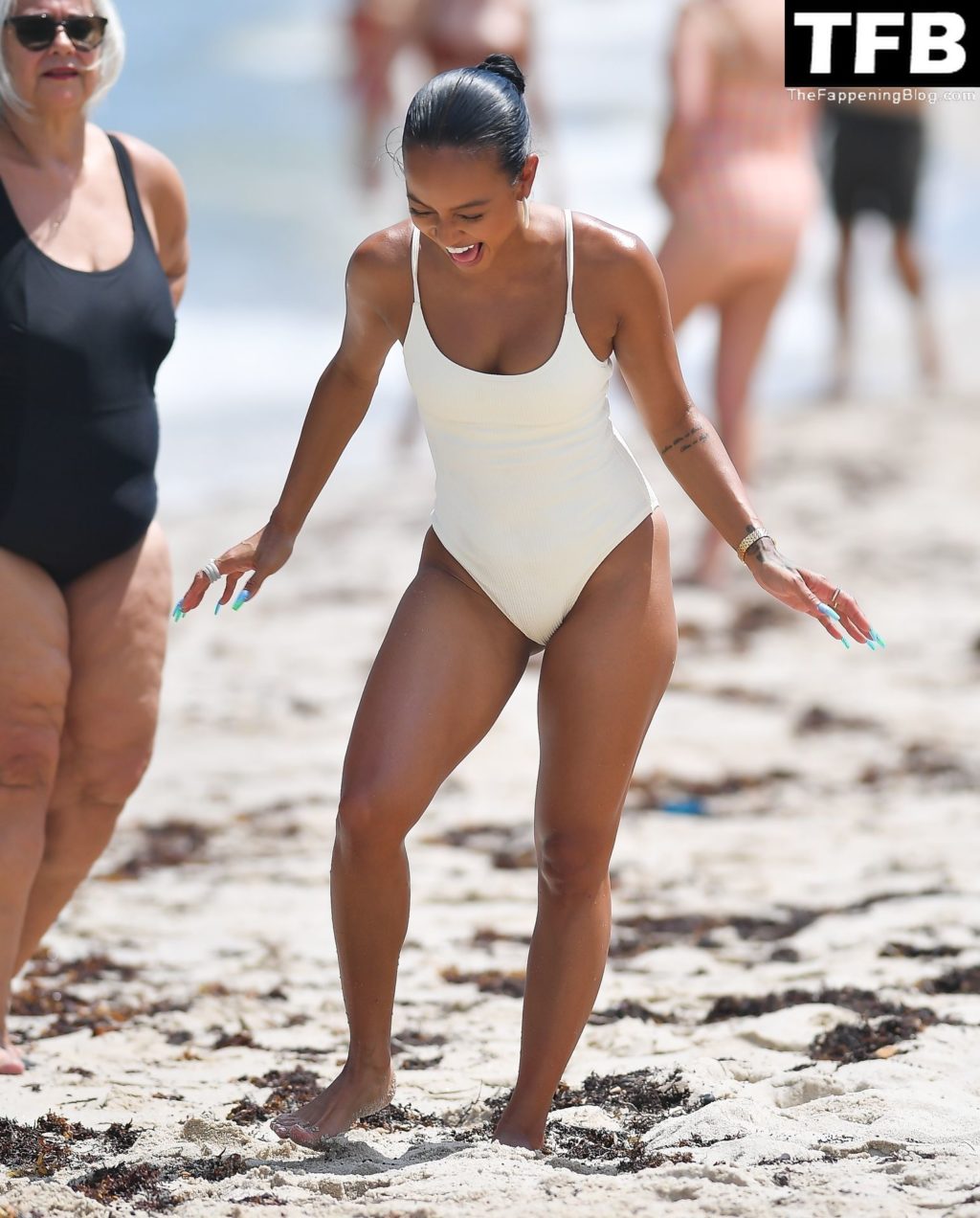 Karrueche Tran Sexy The Fappening Blog 3 1024x1272 - Karrueche Tran Looks Incredible in a White Swimsuit on the Beach in Miami (45 Photos)