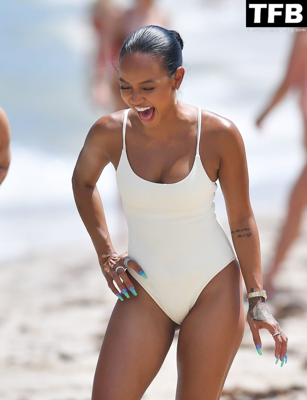 Karrueche Tran Sexy The Fappening Blog 32 1024x1333 - Karrueche Tran Looks Incredible in a White Swimsuit on the Beach in Miami (45 Photos)