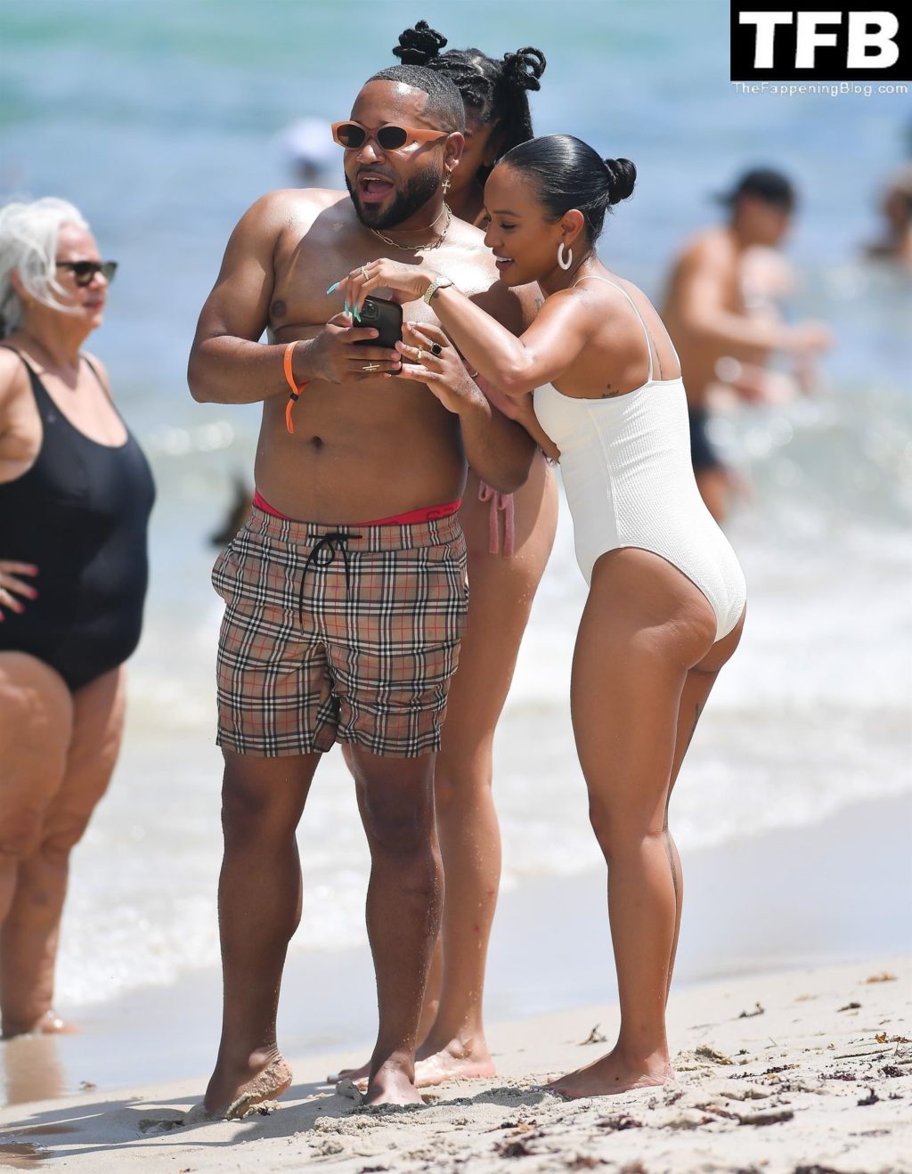 Karrueche Tran Sexy The Fappening Blog 6 1024x1318 - Karrueche Tran Looks Incredible in a White Swimsuit on the Beach in Miami (45 Photos)