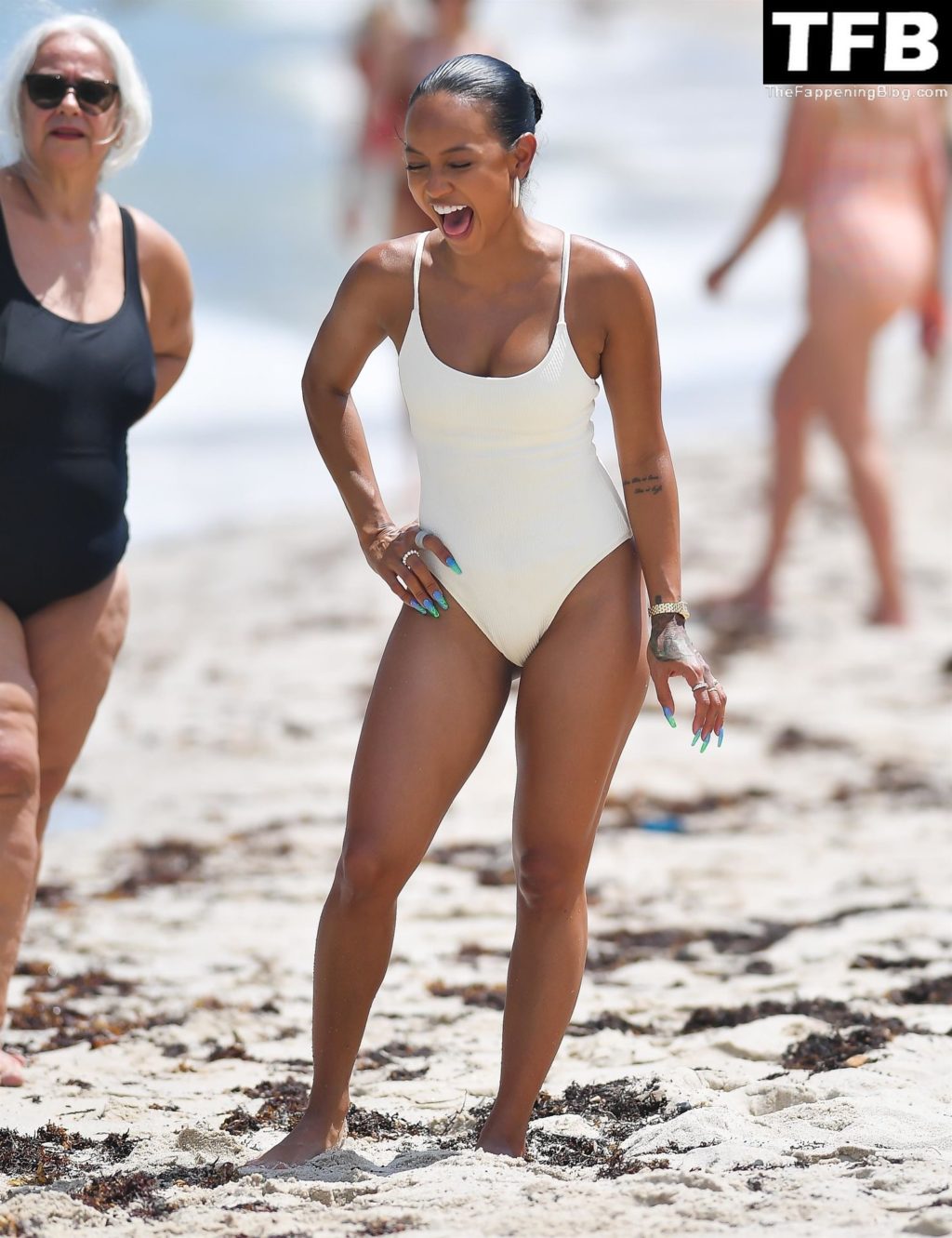 Karrueche Tran Sexy The Fappening Blog 9 1024x1331 - Karrueche Tran Looks Incredible in a White Swimsuit on the Beach in Miami (45 Photos)
