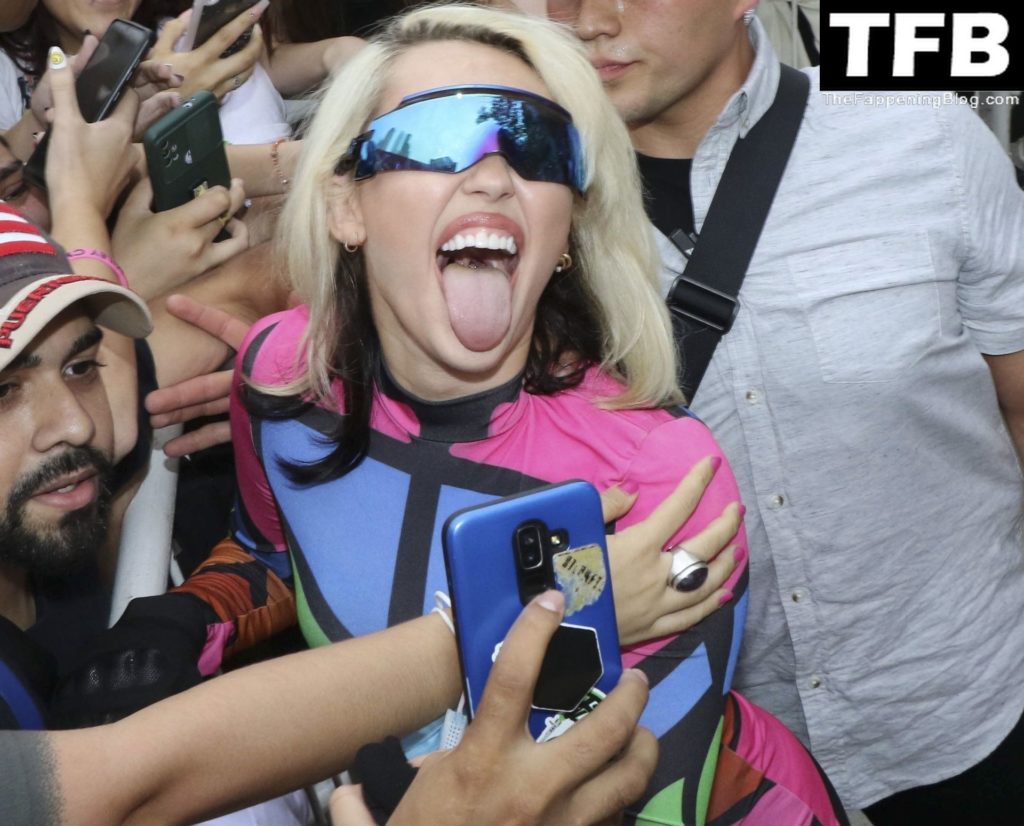 Miley Cyrus Sexy The Fappening Blog 24 1 1024x826 - Miley Cyrus Greets Her Fans as She Arrives in Argentina to Attend the Lollapalooza Festival (27 Photos)